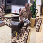 "He thought it was for my sister" – Young boy rolls on the floor as elder sister gifts him a brand new phone (WATCH)