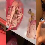 "I can do more than this" – Lady goes to club with empty bag, returns home with wads of cash after a nightlife with her man and his friends (WATCH)