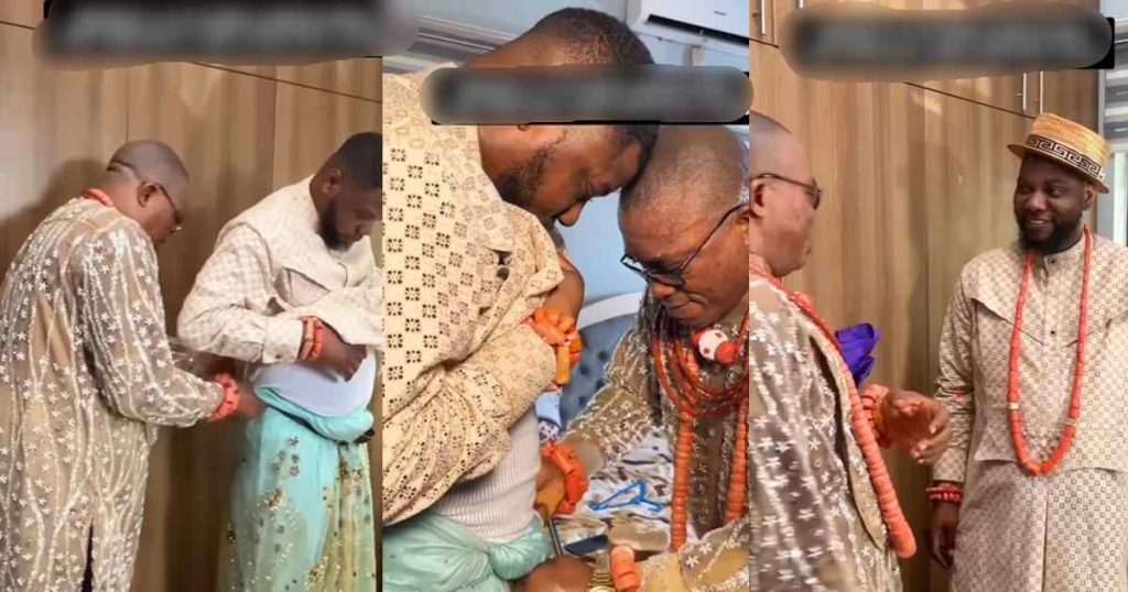 Heartwarming moment Isoko father-in-law prepares Yoruba groom for wedding with traditional Isoko outfit (WATCH)