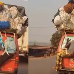 "Na like this I dey go village for Christmas" – Video of men "waybilled" to the back of a moving bus trends (WATCH)
