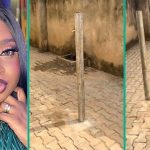 Tenant Cries Out as Landlady Allegedly Erects 2 Poles In Compound to Stop People from Parking Cars