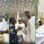 Peeps React to Video of Policeman Holding Cash Bundles for Billionaire Okoya’s Sons: “Disrespectful”